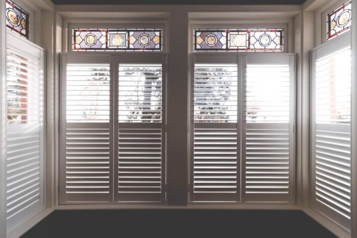 Bay-Window-with-Stained-Glass-and-Plantation-Shutters-1024x683