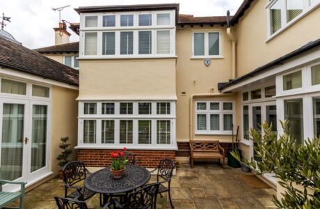 Garden-view-of-house-with-large-timber-casement-windows-Ernle-Road-Wimbledon-1024x683