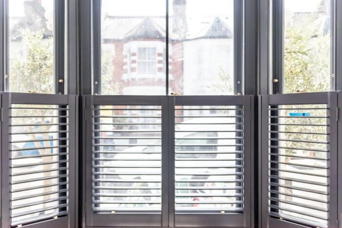 Open-wooden-plantation-shutters-for-sash-windows-1024x683