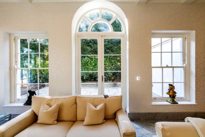 Sitting-French-Patio-Doors-with-Arched-Fanlight-and-Georgian-Sash-Windows-Either-Side-1024x683