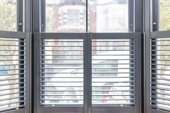 sash-window-with-half-plantation-shutters-1024x683
